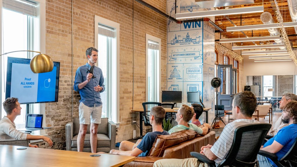 Millennial workplace learning occurs in a modern, loft-style office.