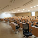 A college lecture hall sits empty.