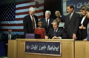 George W. Bush signs No Child Left Behind into law